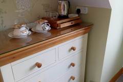 Chest of drawers with hot drinks